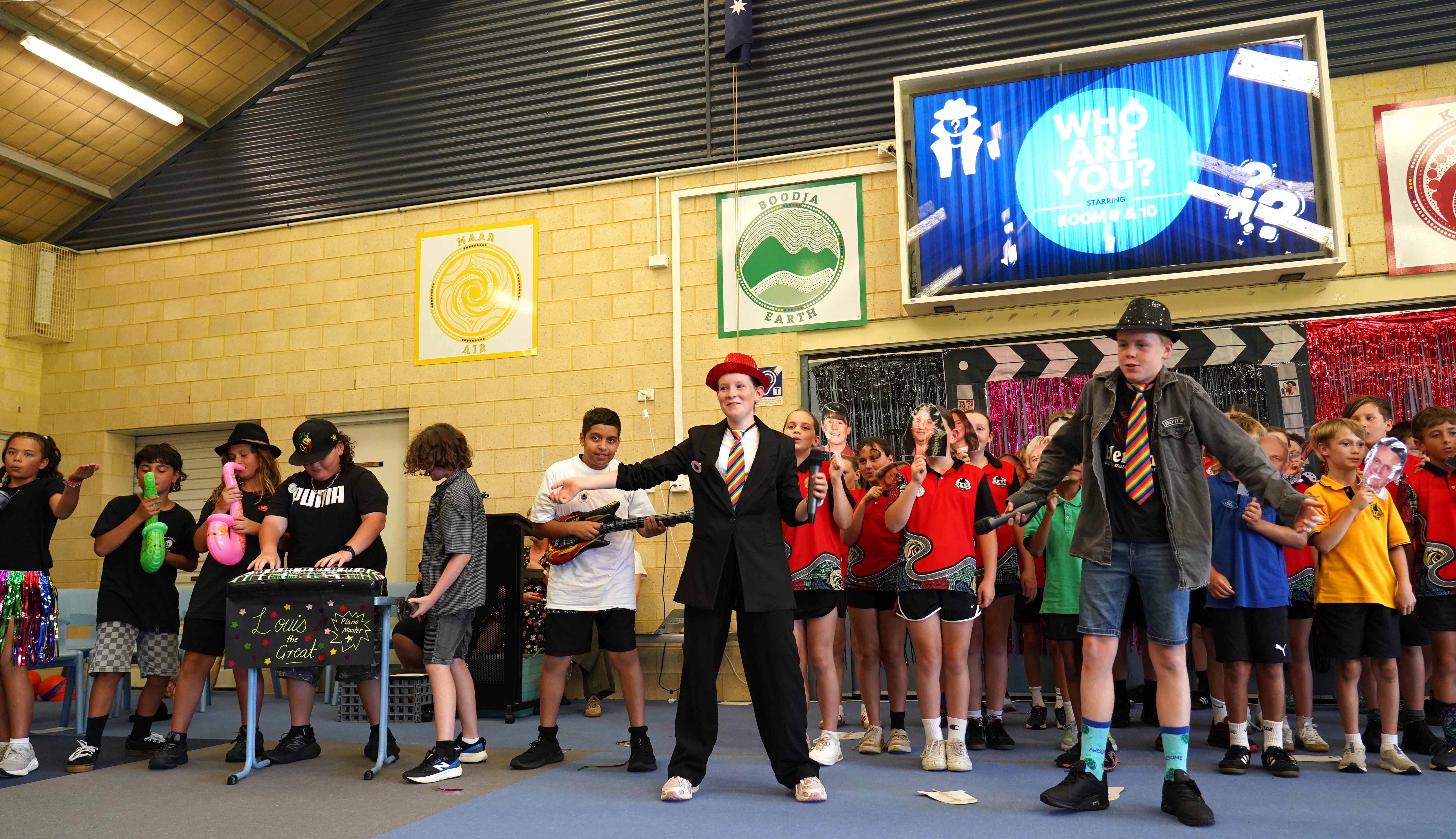 /uploaded_files/media/gallery/1773120267Band & presenters.JPG